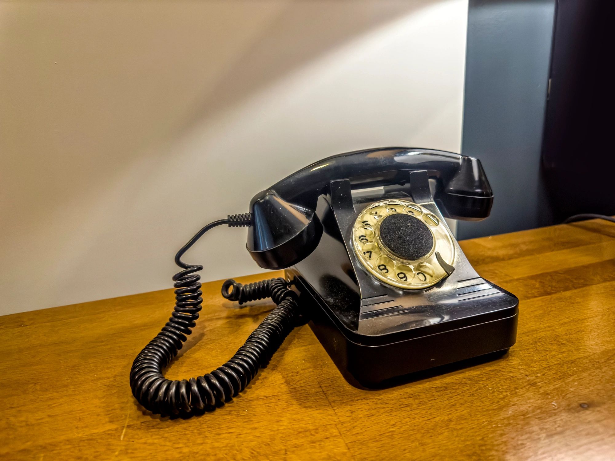 Close up vintage style black analog phone