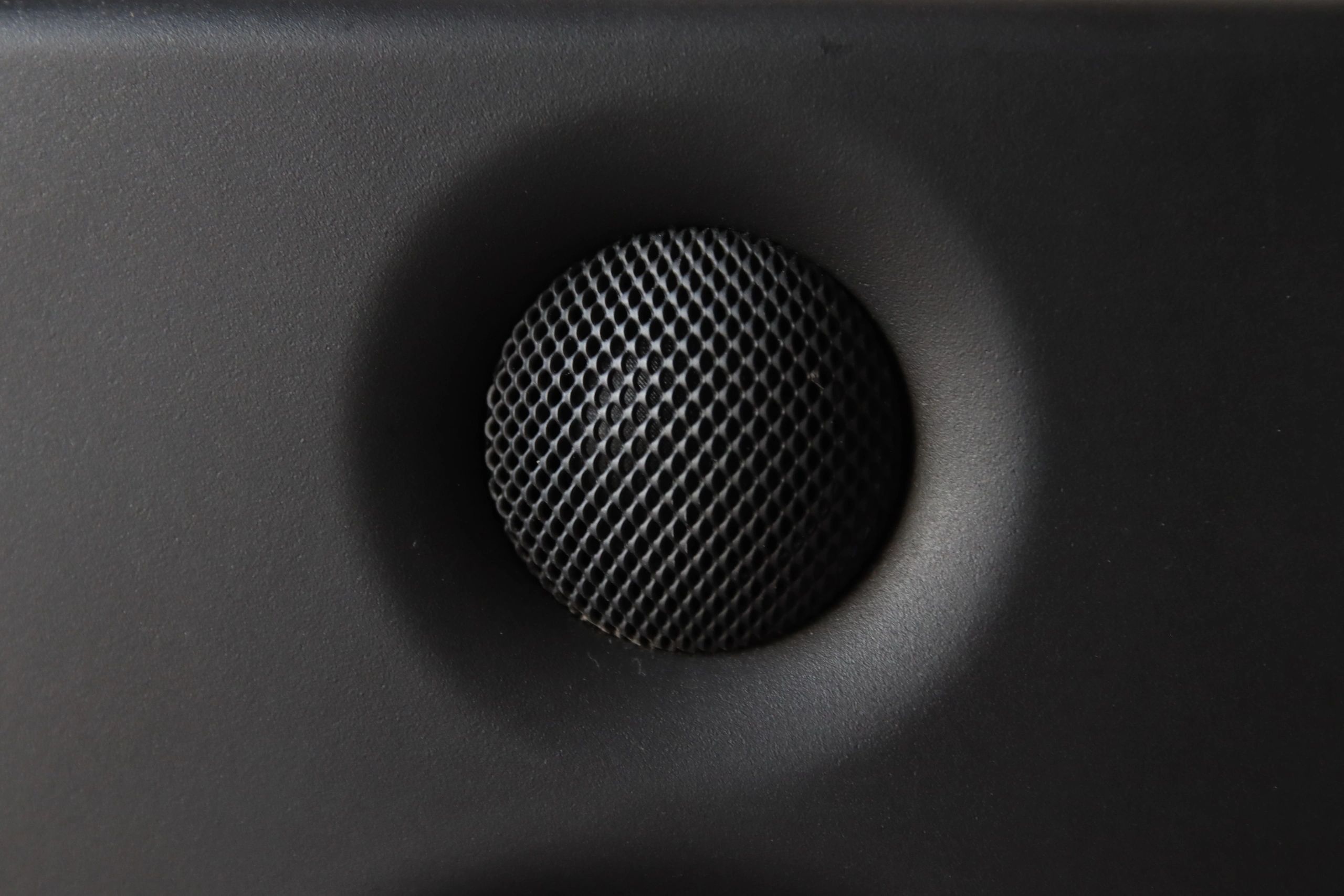 Close-up of a speaker grille texture